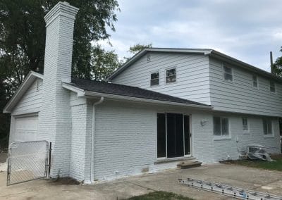 exterior brick house painted white